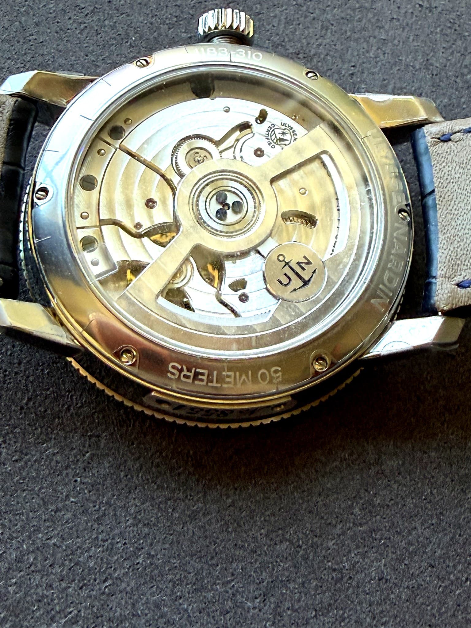 Ulysse Nardin Maxi Marine Chronometer 263-66 overhead flat lay on grey surface